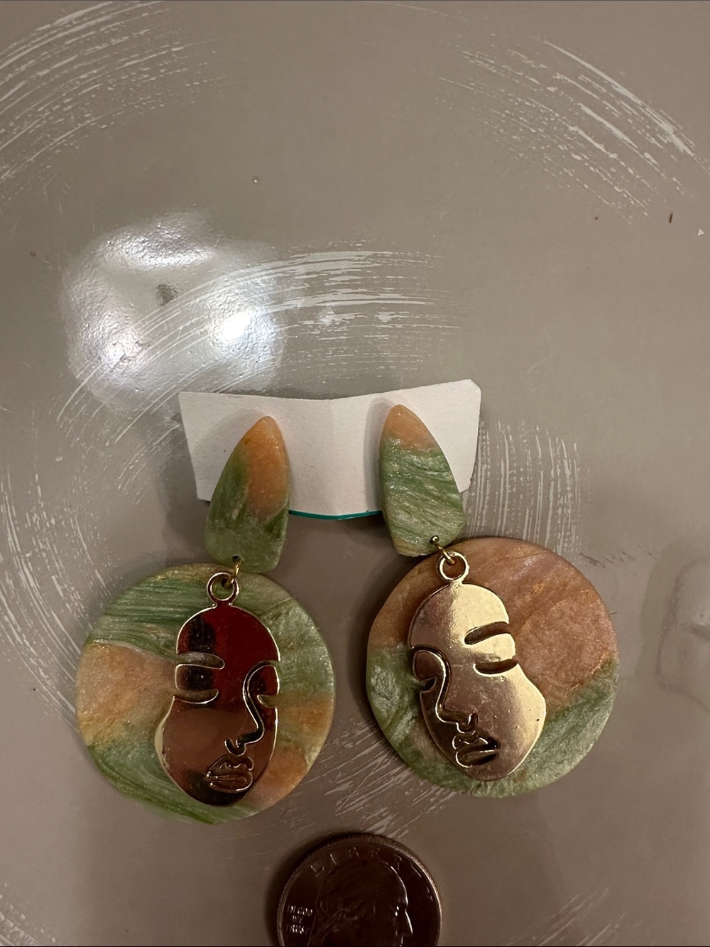 Gold Face Outline Dangle Earrings in Green and Tan